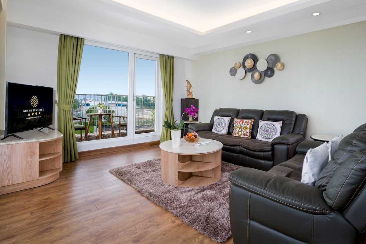 Junior Suite With Balcony | Living area | 43-inch LCD TV with cable channels, TV