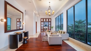 Suite with Private Meeting Room | Living area | 43-inch LCD TV with cable channels, TV
