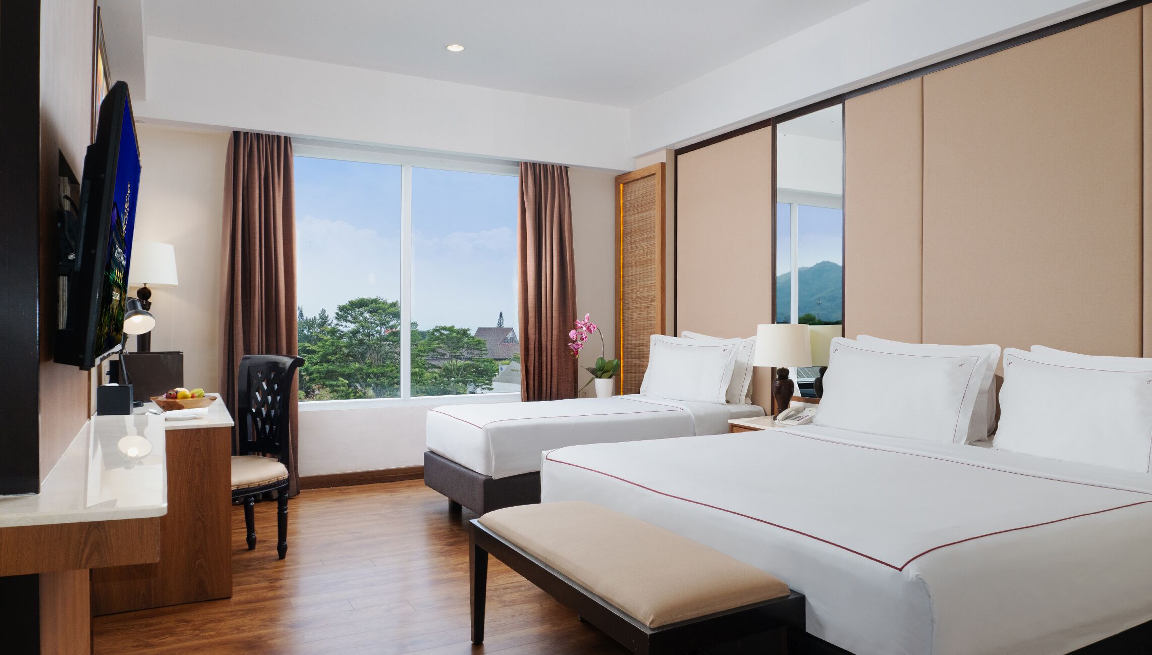 Family Room, Multiple Beds | Minibar, in-room safe, soundproofing, iron/ironing board