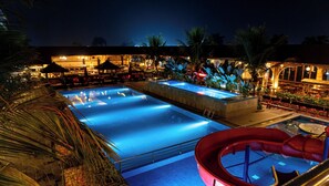 2 outdoor pools, open 6:00 AM to 6:00 PM, pool loungers