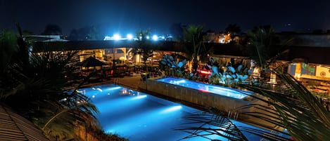 2 outdoor pools, open 6:00 AM to 10:00 PM, pool loungers