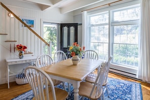 Enjoy meals in this traditional dining area with a wooden table and six chairs.