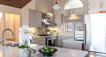 Jaw dropping mountain & lake views in this stylish mountain home….