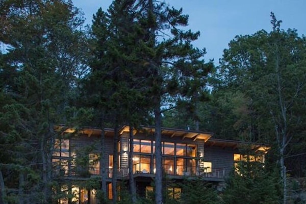 As seen from the shore at dusk