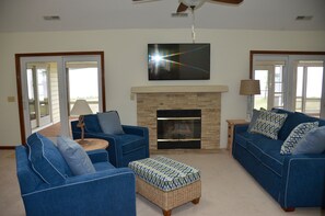Smart TV, fireplace, DVD player, books