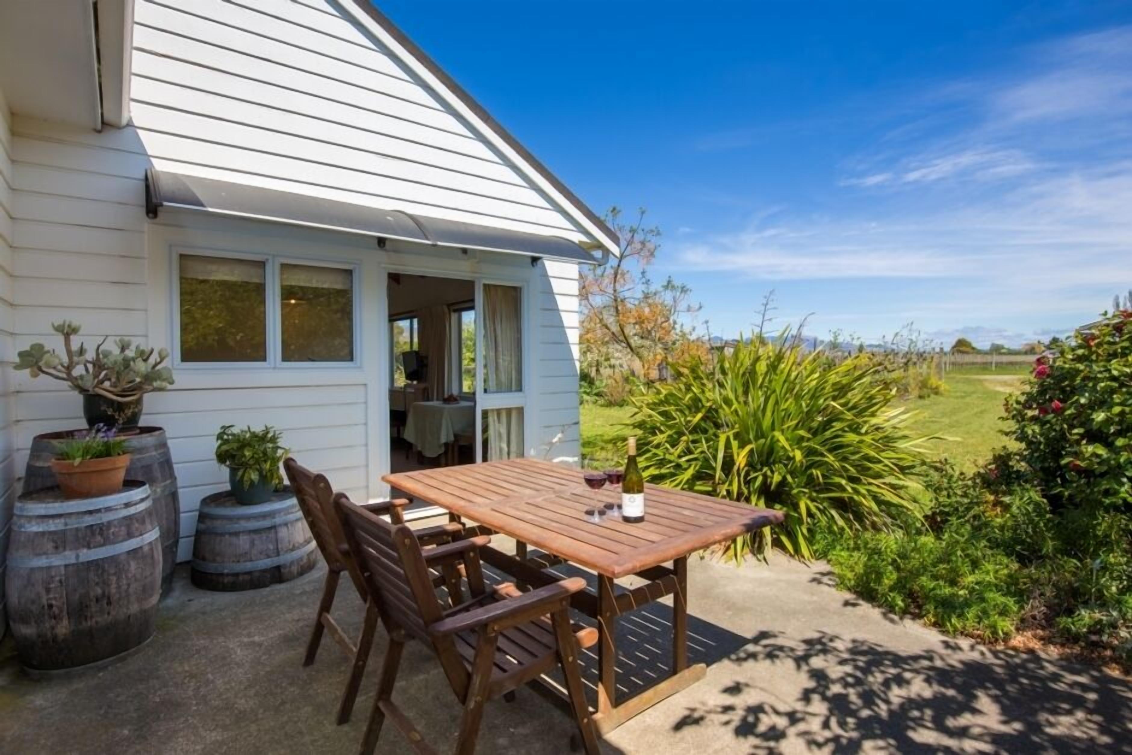 Patio looking towards vege garden and vineyard