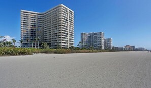 On the beach, sun loungers, beach towels