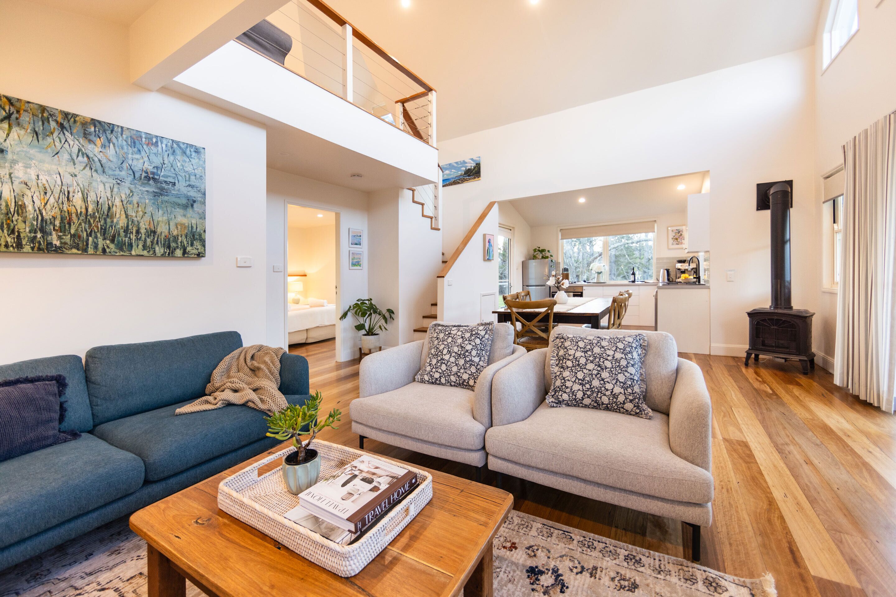 Wattamolla Lodge | Living area | LCD TV, fireplace, DVD player, MP3 dock