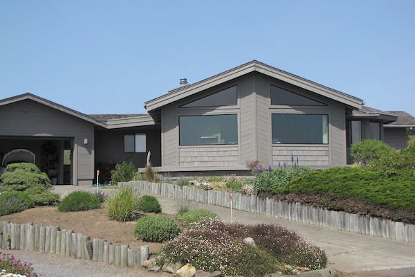 Street view of house front.