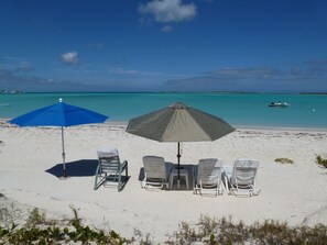 On the beach, sun-loungers, beach towels