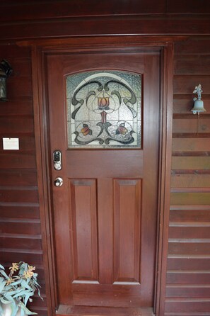 Interior - Bluebell Cottage set amongst the trees which attract many native birds. (Leura)