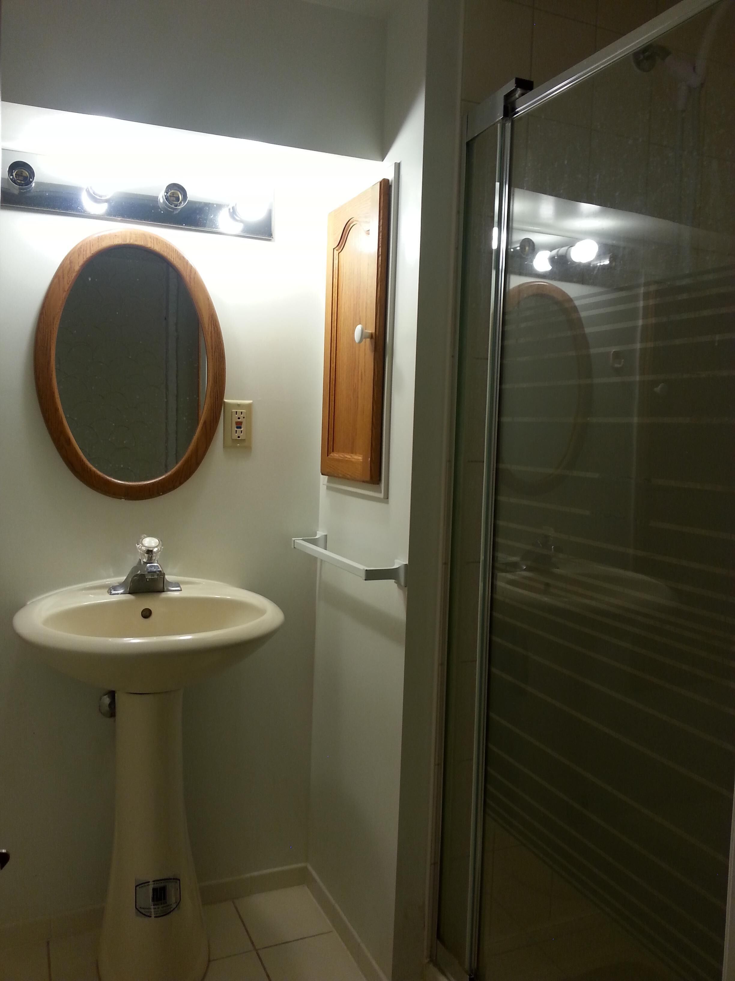 Bathroom with shower (no bathtub)