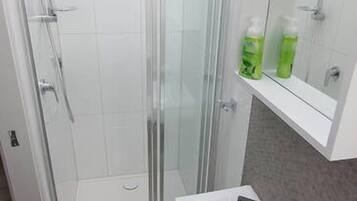 Shower, towels, soap, shampoo