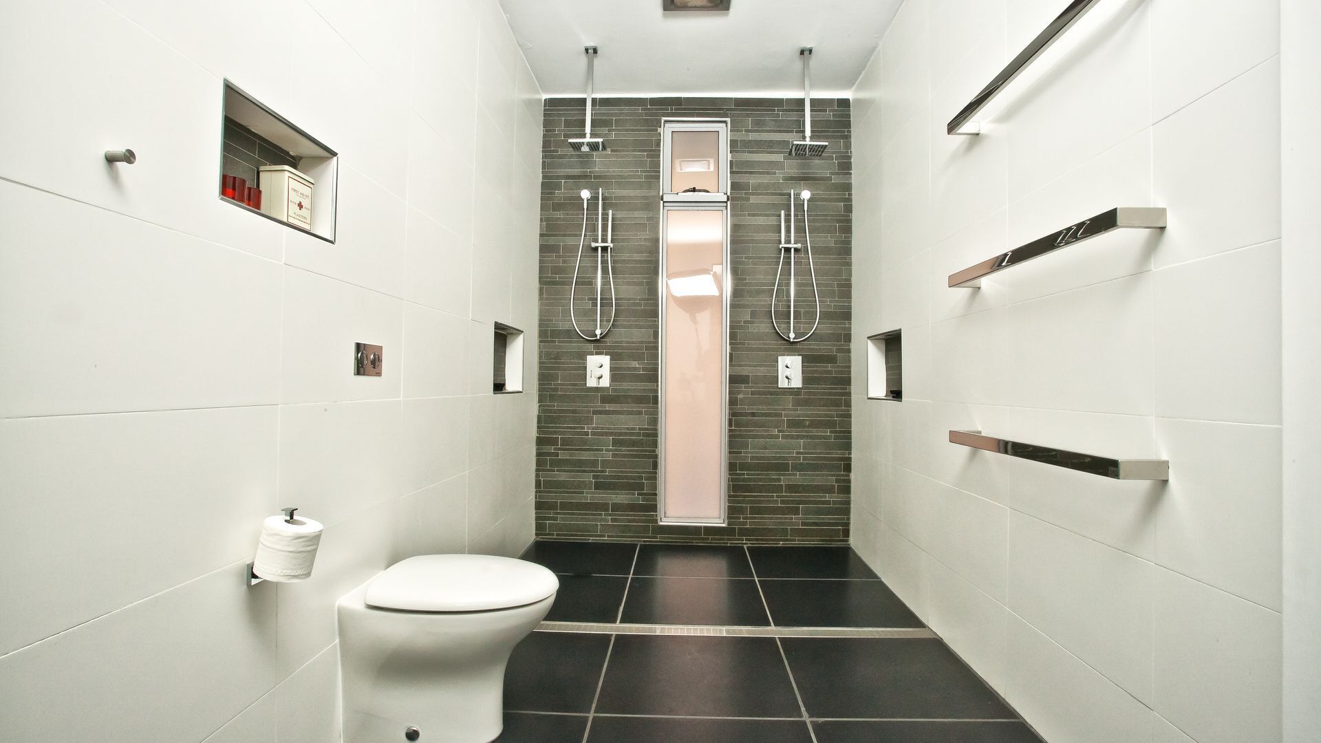 Shower, hair dryer, towels, toilet paper