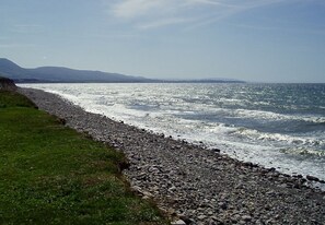 On the beach, sun-loungers, beach towels