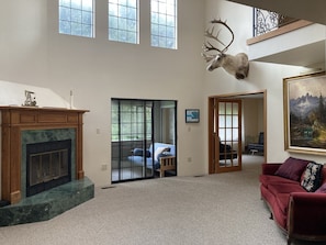 Entry leads to porch and living room