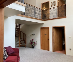 Large entry with staircase to loft and 2nd floor