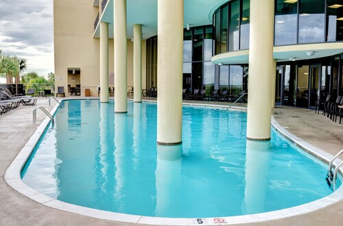 Rare Larger Corner Unit in Holiday Isles with wrap-around Balconies!