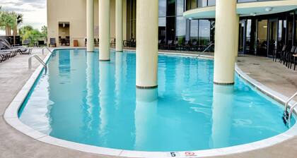 Rare Larger Corner Unit in Holiday Isles with wrap-around Balconies!