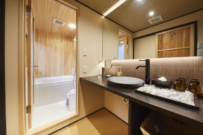 Separate tub and shower, deep soaking tub, free toiletries, hair dryer