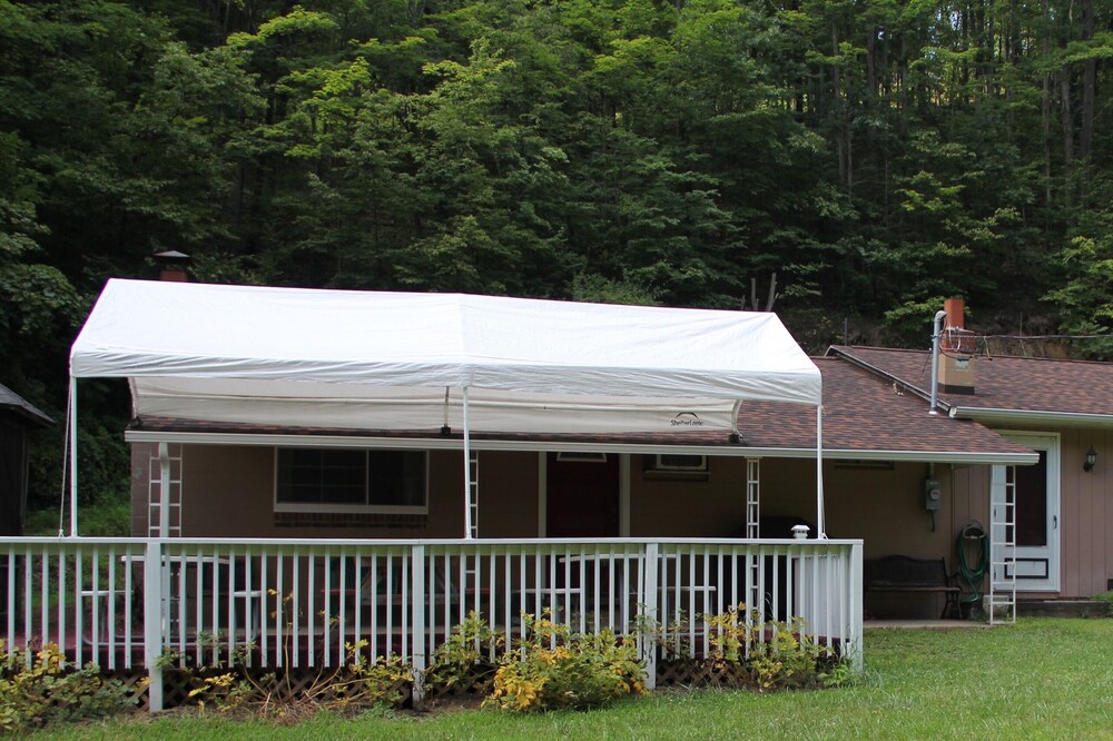 Andrus Cottage located 3/10s of a mile from a beautiful cove on Raystown Lake.