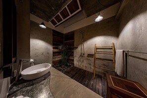 A modern bathroom with a large basin, wooden accents, and a shower. - Club Gabbiano Rasdhoo (Rasdhoo)