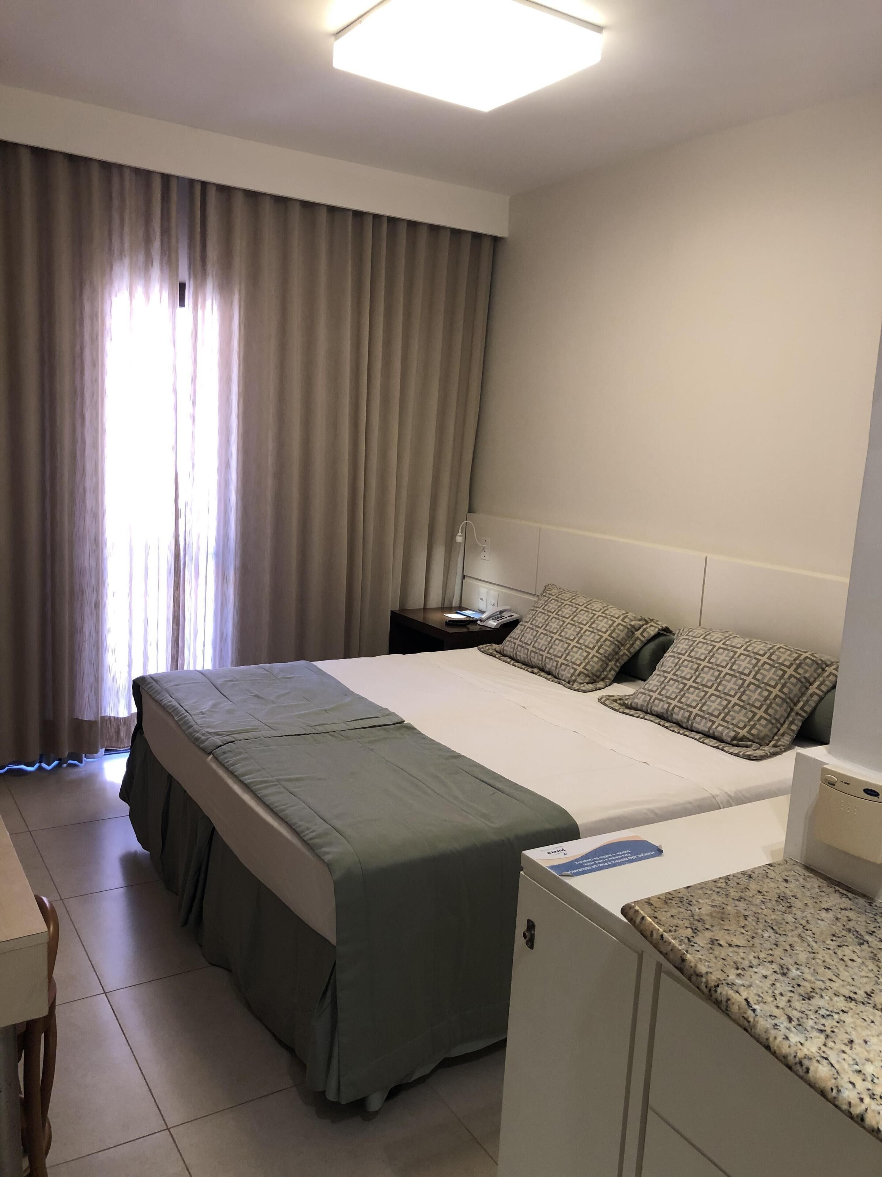 Foot in the sand in Jurerê Internacional