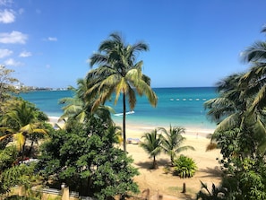 On the beach, sun-loungers, beach towels