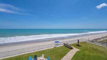 On the beach, sun-loungers, beach towels