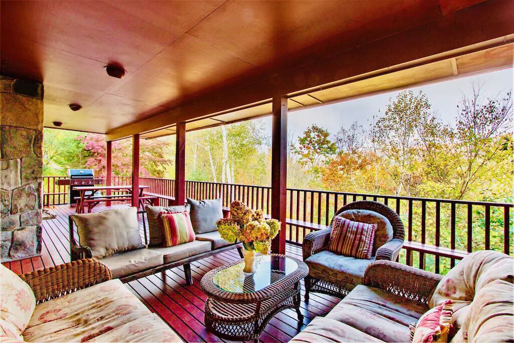 Best Family Reunion House: Huge covered deck, double height ceilings, great hang out space. Dogs welcome.