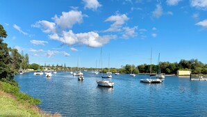 A marina with multiple sailboats docked. - 35 YAMBA STREET Dog friendly (Yamba)