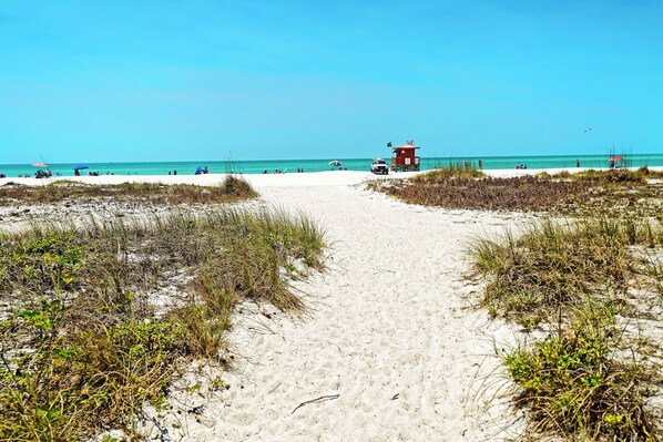 On the beach, sun loungers