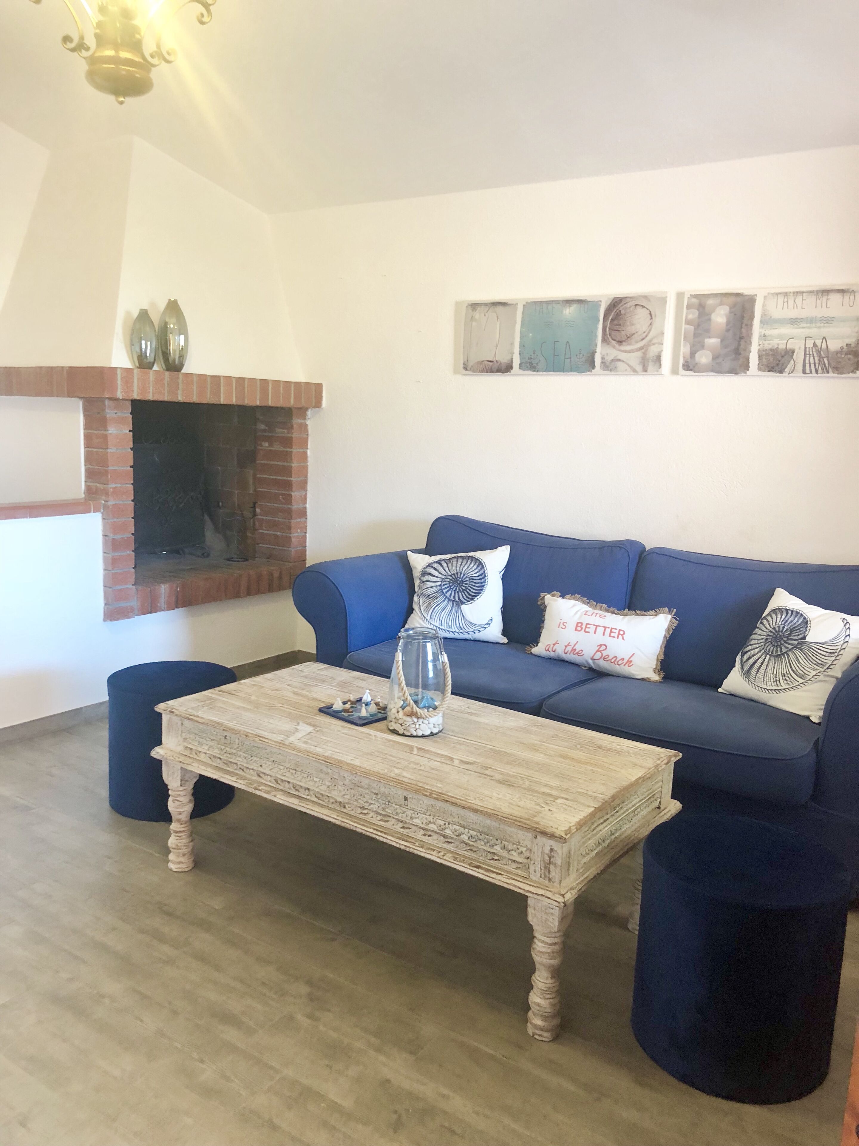 TV, fireplace, books