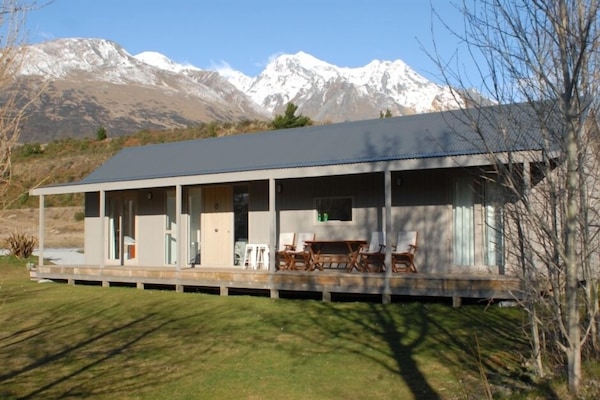 North facing with French doors opening onto the de