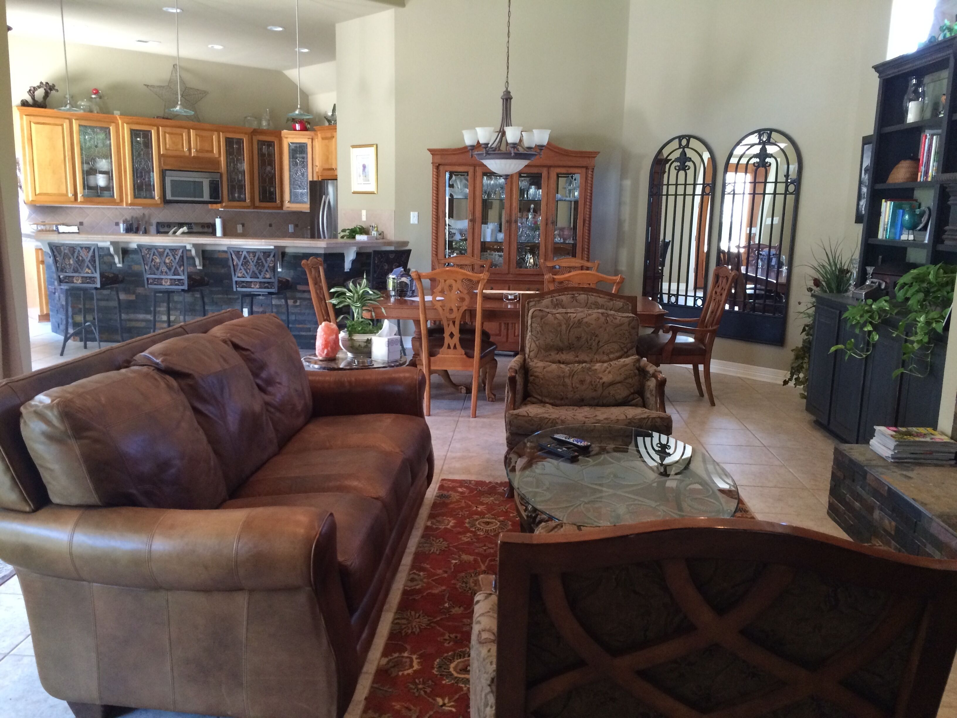 Beautiful  3 bdrm. home with large tropical patio, hot tub in gated community