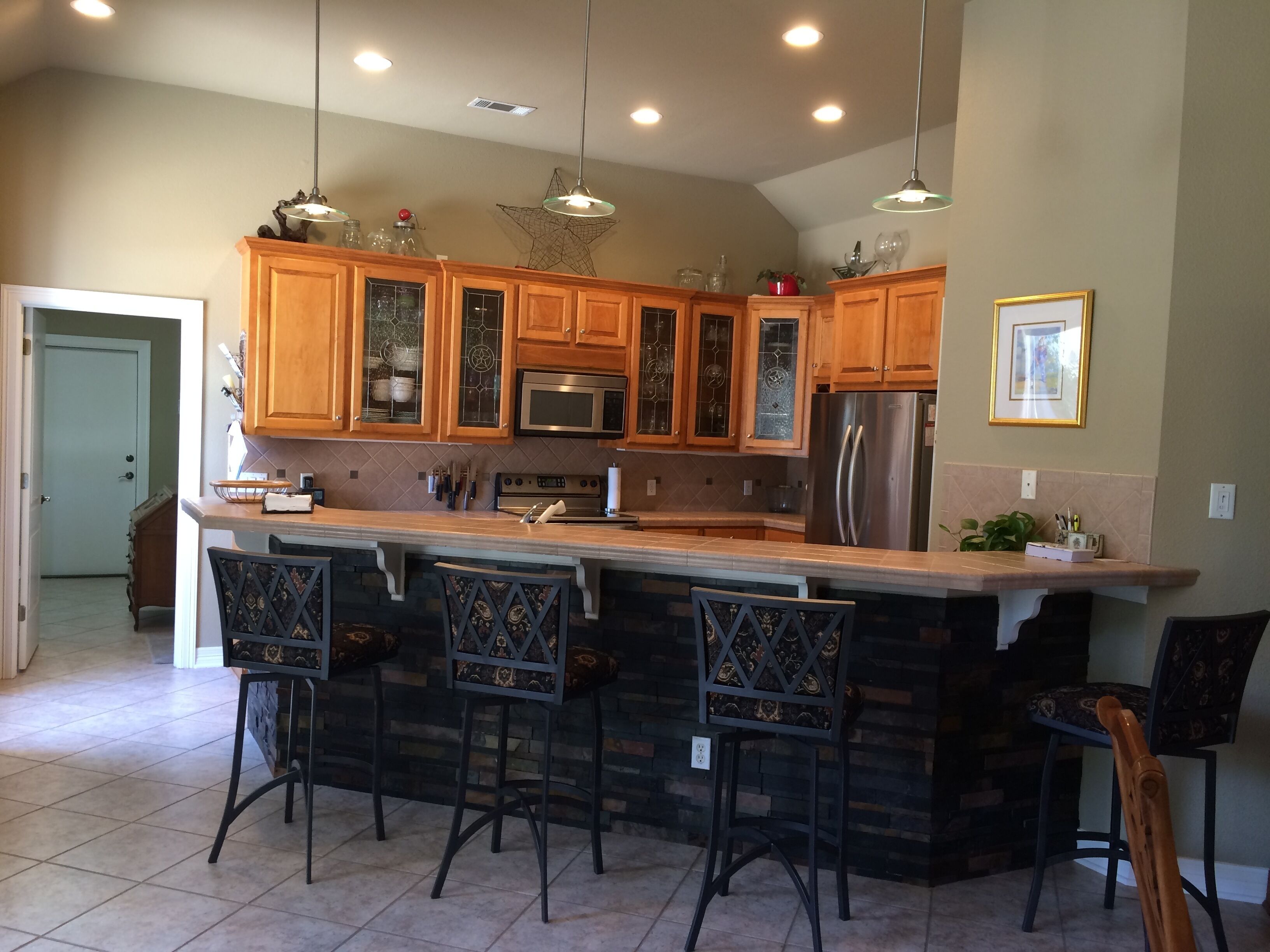 Beautiful  3 bdrm. home with large tropical patio, hot tub in gated community