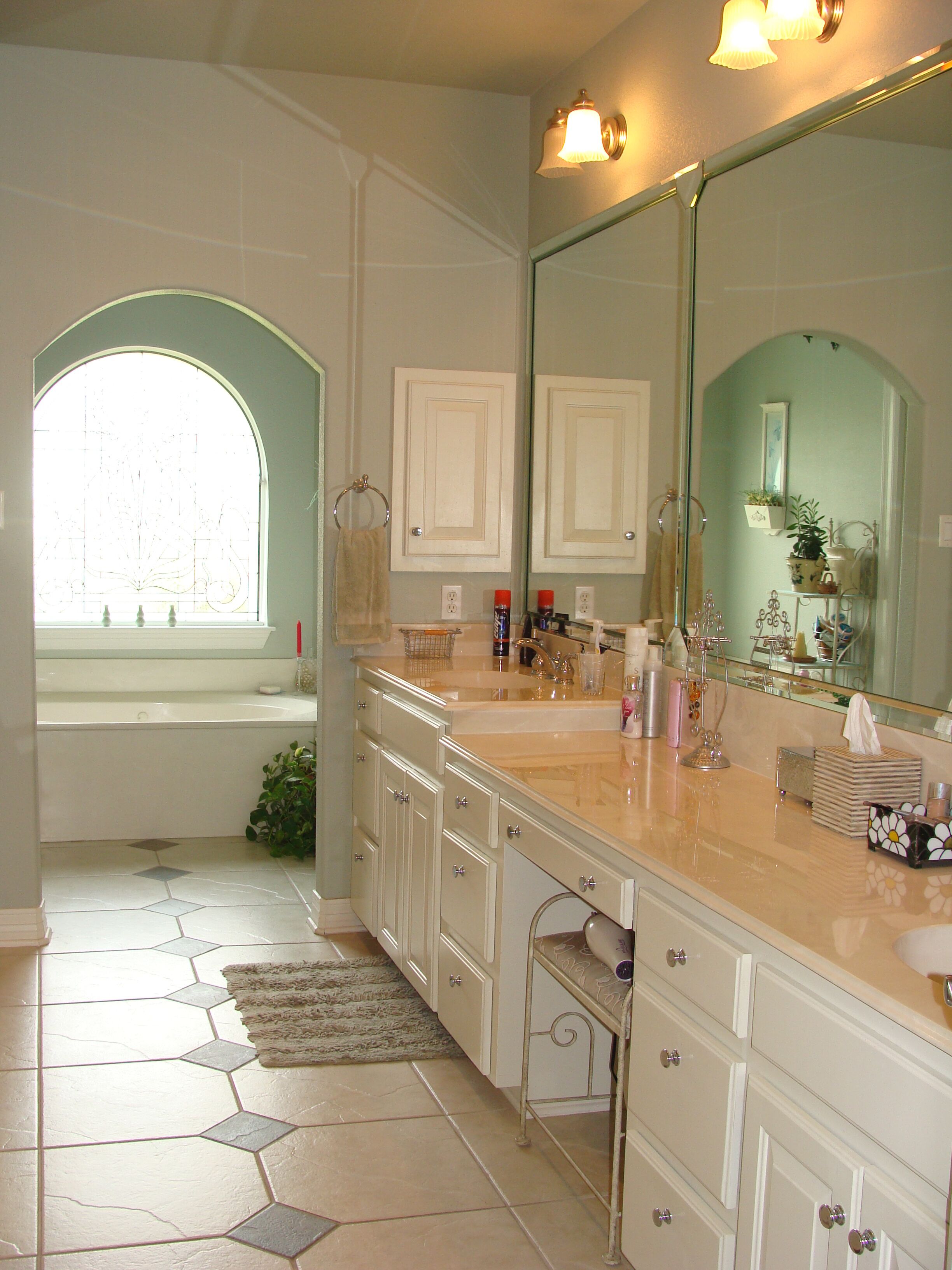 Beautiful  3 bdrm. home with large tropical patio, hot tub in gated community