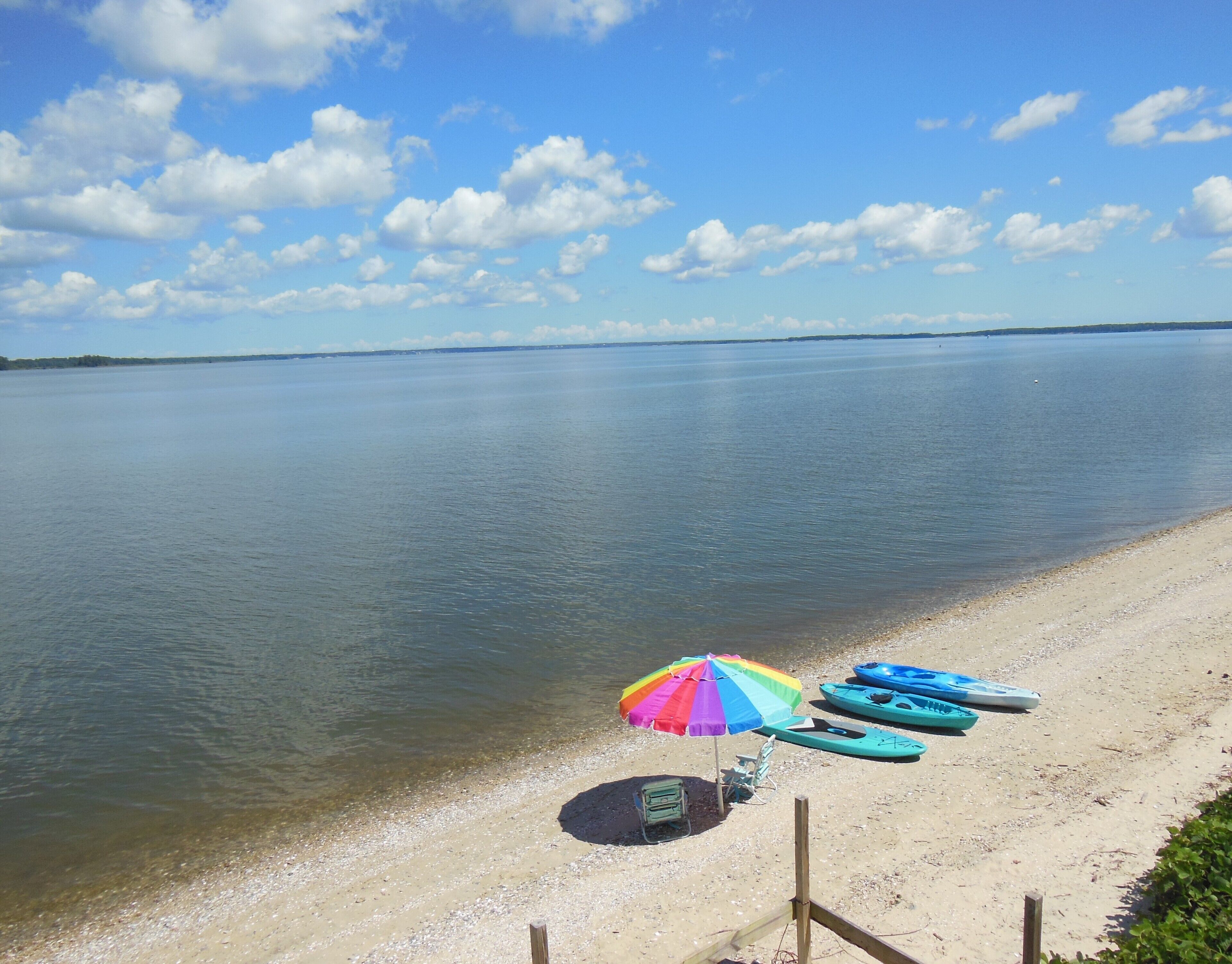 On the beach, sun-loungers, beach umbrellas, beach towels