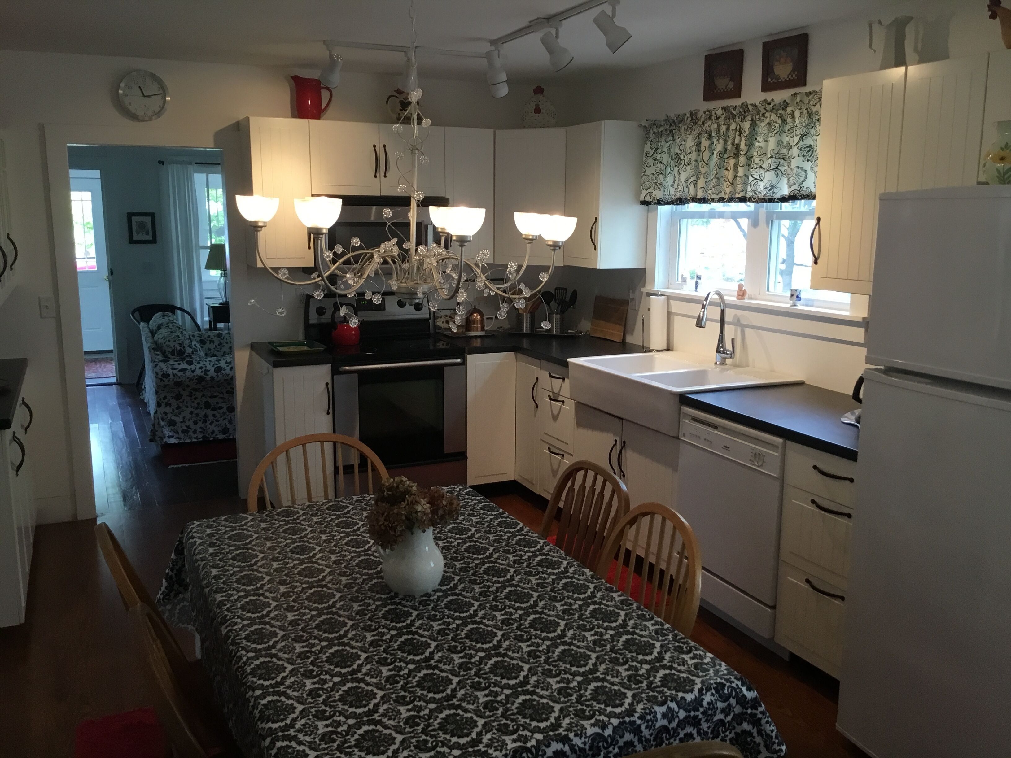 A picture perfect restored original cottage located inside the gates of Lakeside