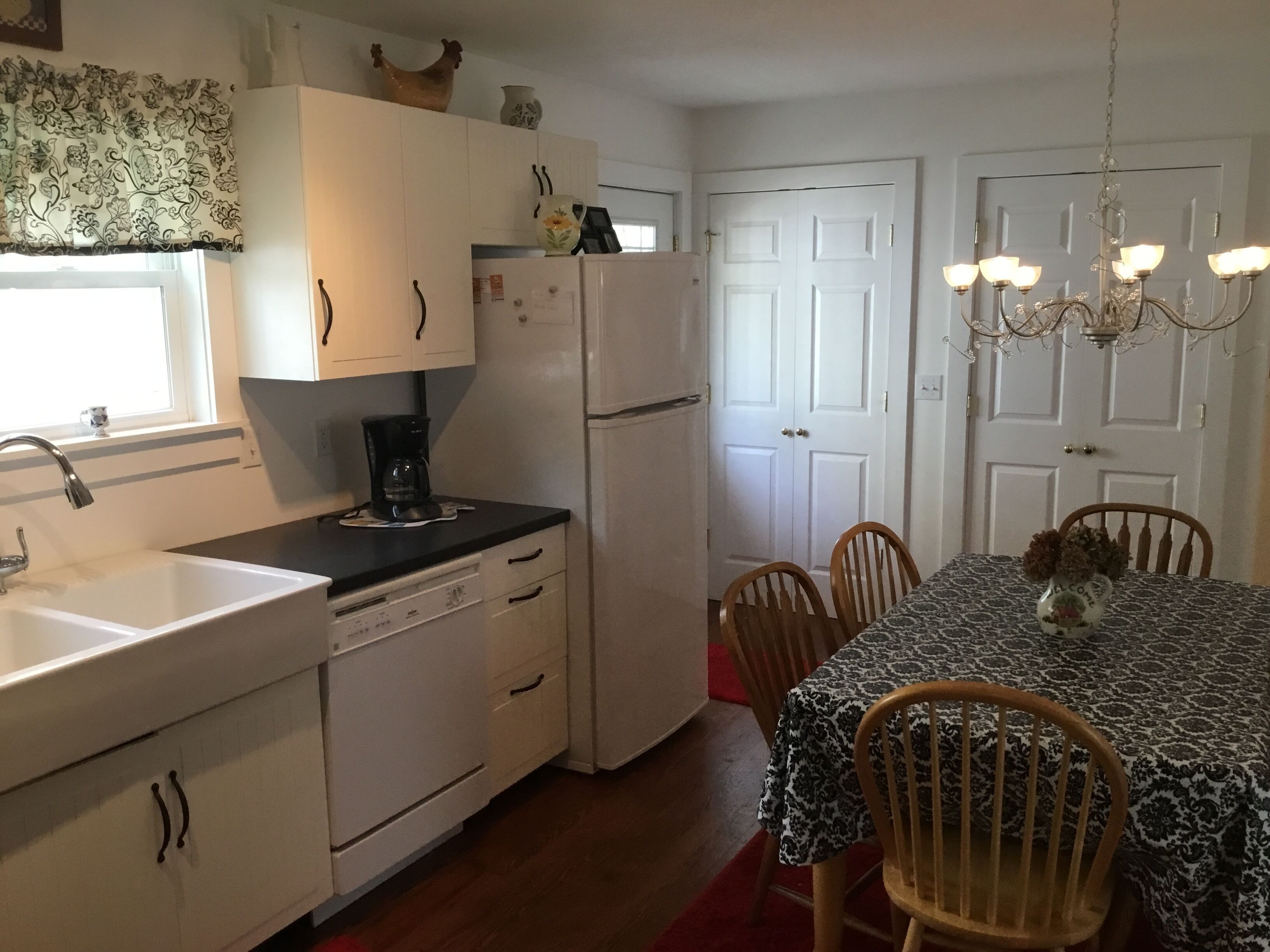 A picture perfect restored original cottage located inside the gates of Lakeside