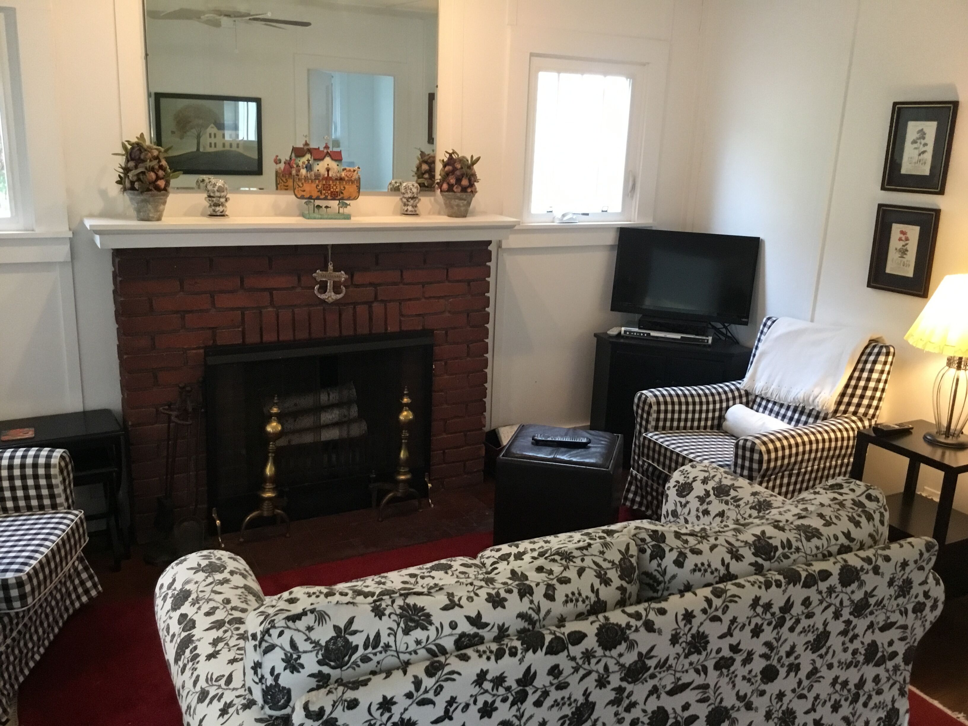 A picture perfect restored original cottage located inside the gates of Lakeside