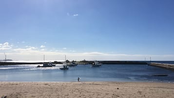 On the beach, sun loungers