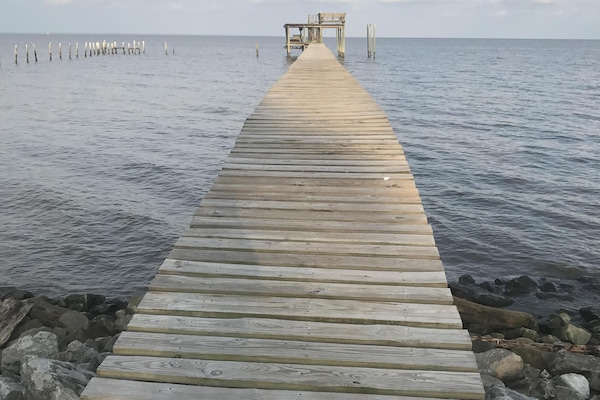350 foot pier with two swings, a hammock, water, lights, fishing deck