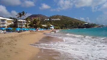 On the beach, sun loungers, beach towels