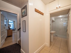 Bathtub, hair dryer, bidet, towels