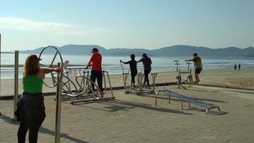 On the beach, sun loungers