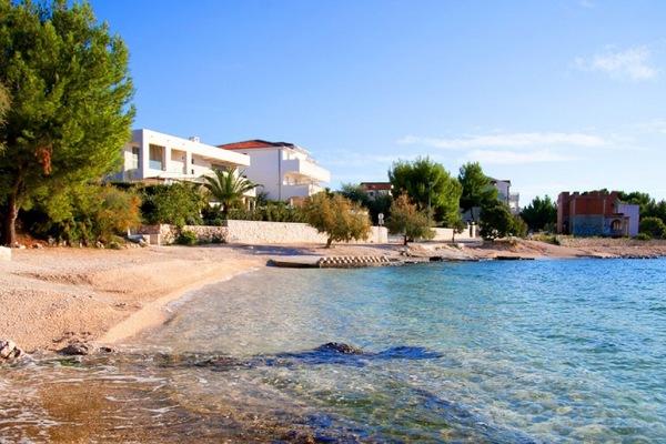 local beach 150m from the apt