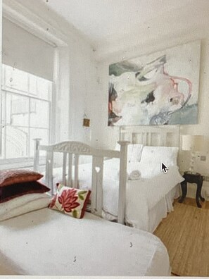 2 bedrooms, desk, iron/ironing board, travel crib