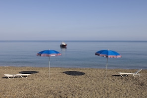 On the beach, sun-loungers - Much loved seaside rental home for 8/10 in stunning unspoilt Tuscany.  (Populonia, Piombino)