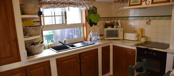 Beach Villa på sanddynene Faro Beach med stor kajakk og 2 sykler